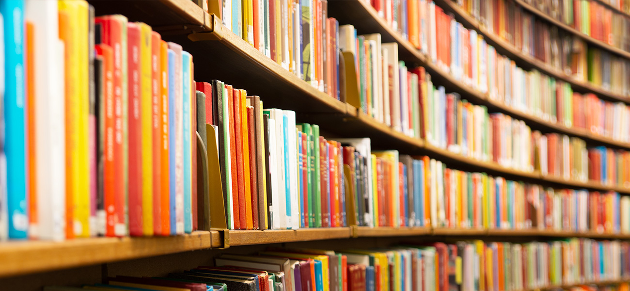 Books on library shelves.